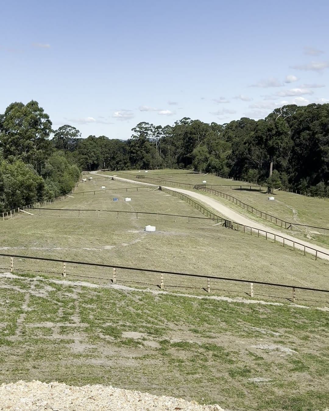 Earthworks and levelled ground on a rise above a lake